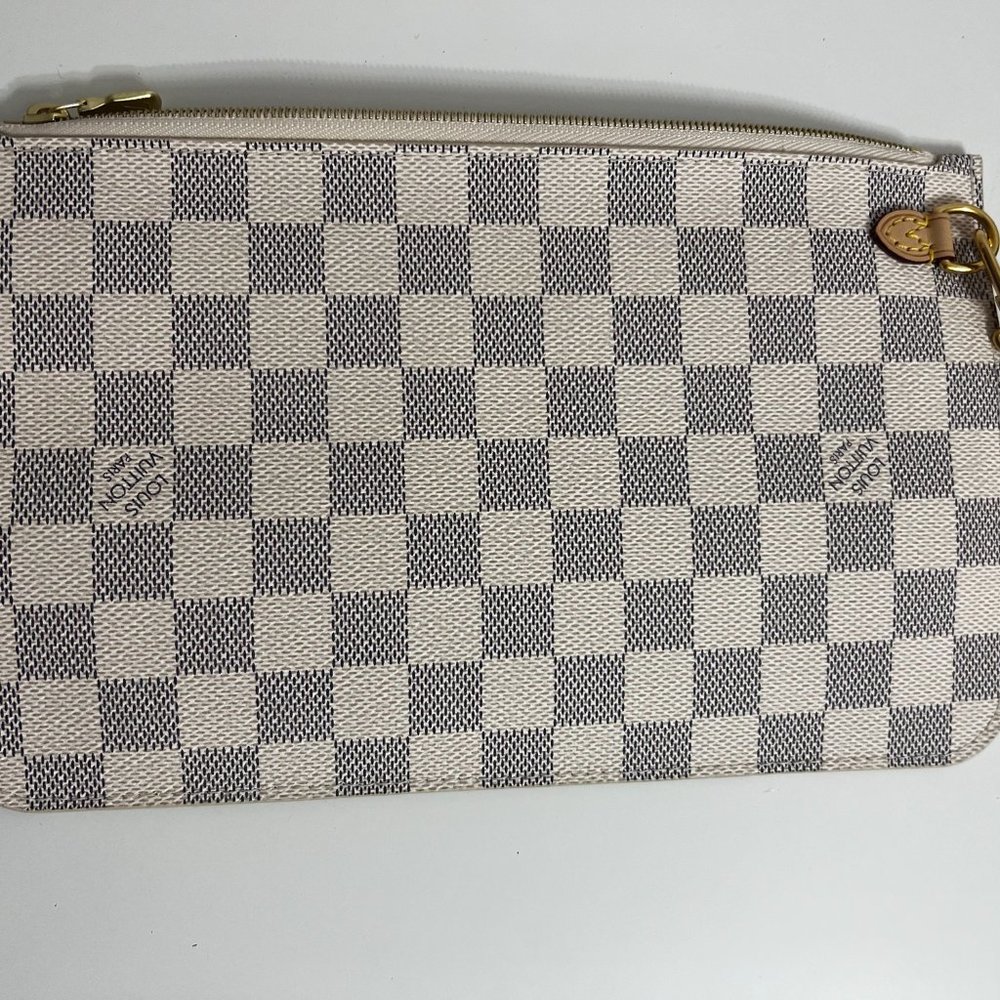 Authentic Louis Vuitton Neverfull azur wristlet